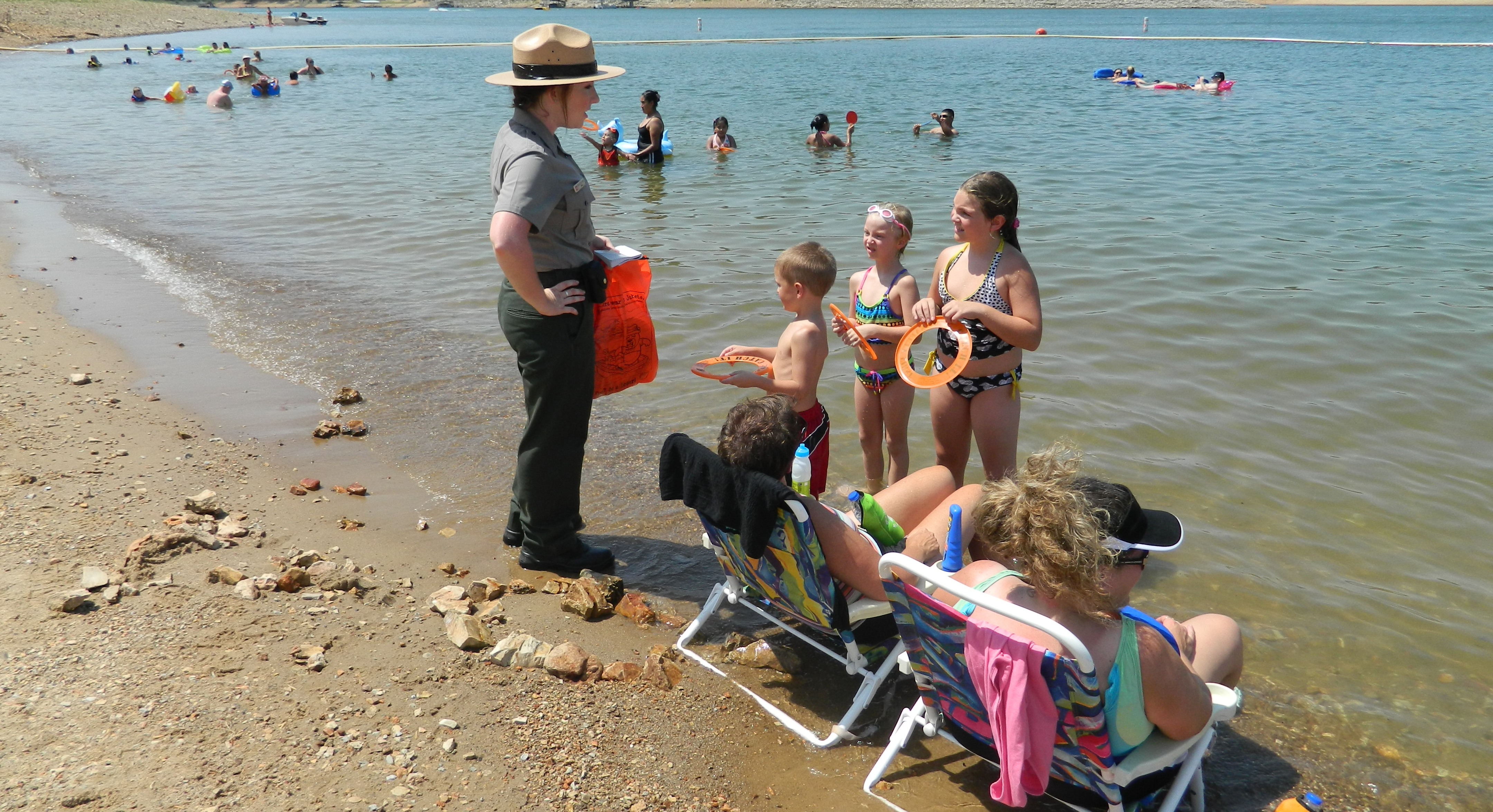 Ranger educating children about water safety
