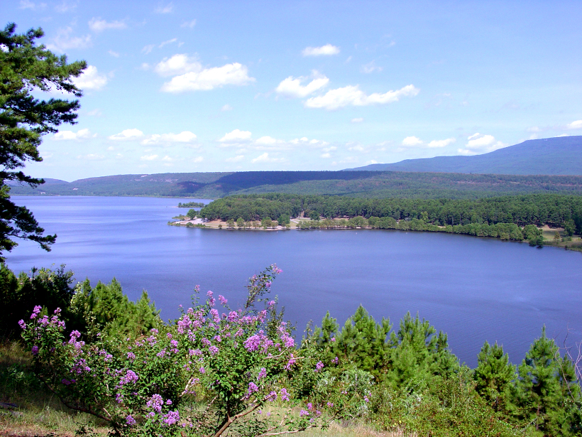 view of blue mountain lake from an overlook