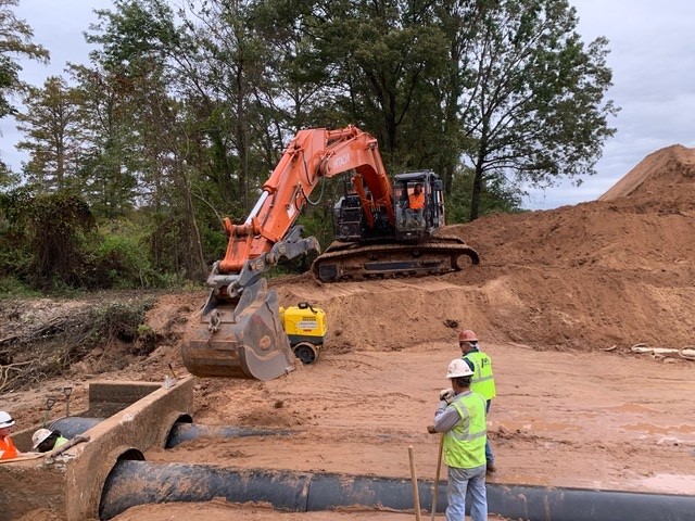 heavy equipment working on turned earth